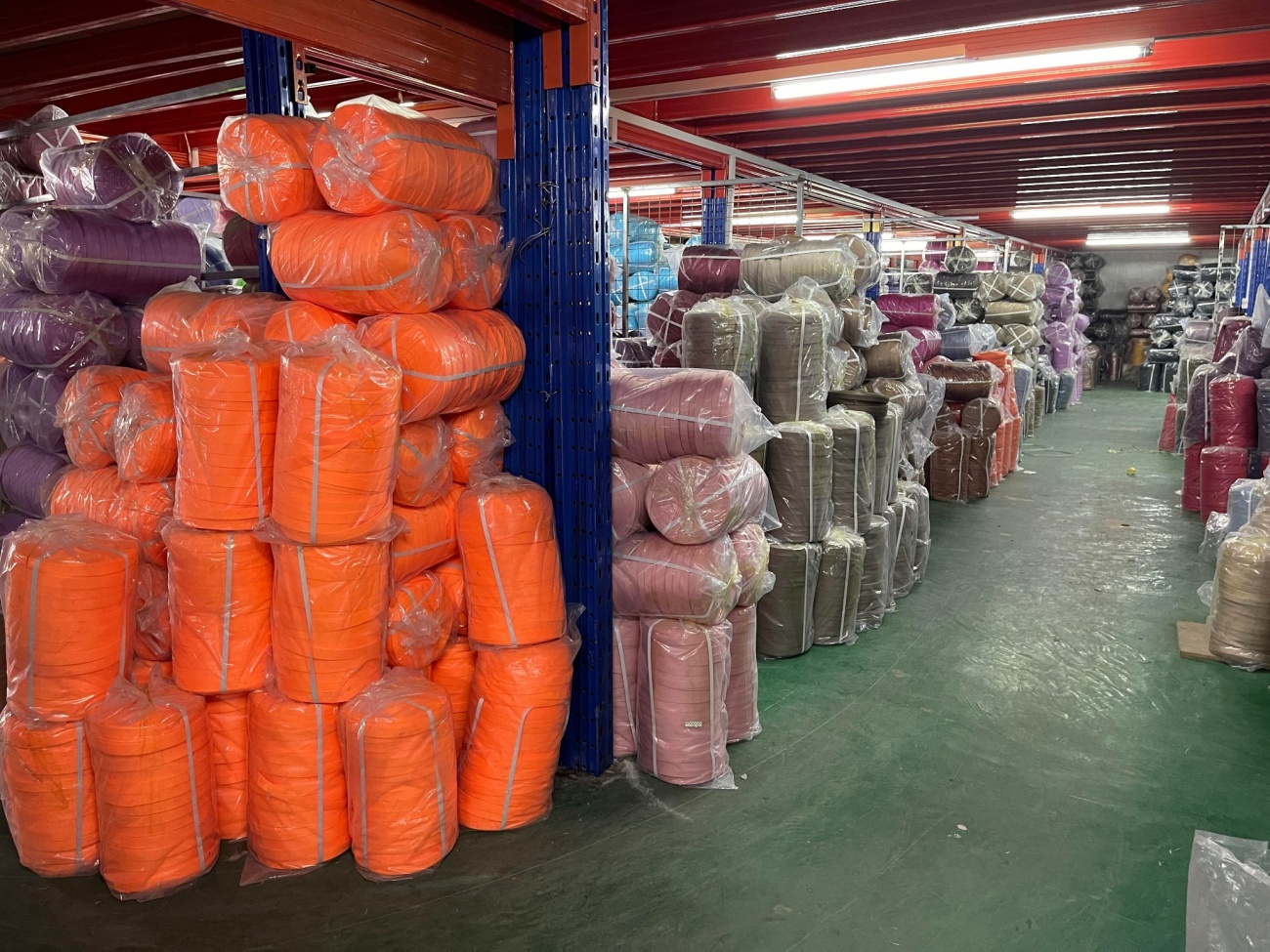 Packed Colored Webbing Rolls in Storage